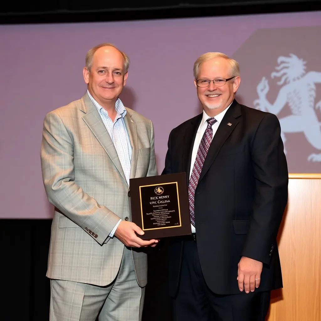 Rick Henry Receives Distinguished Alumni Award from the University of South Carolina